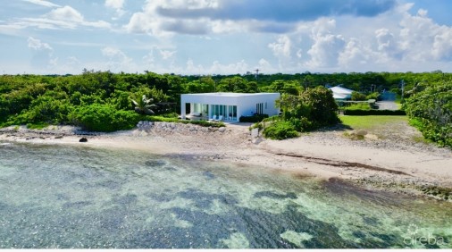 Seaside Hideaway - Fully Renovated Beachfront Gem