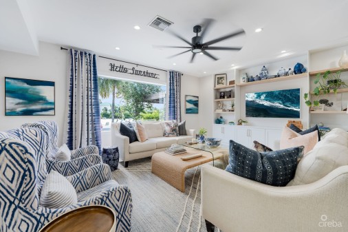 Fully Renovated 4-bed Canal Front Home With Den & Dock | The Shores