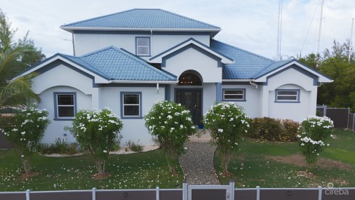 Sun Rose Canal Front Home - North Sound Estates