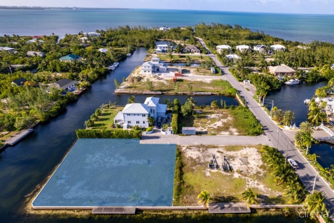 HERON BAY CORNER CANAL LOT