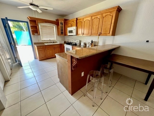 WEST BAY FOURPLEX INVESTMENT HOME