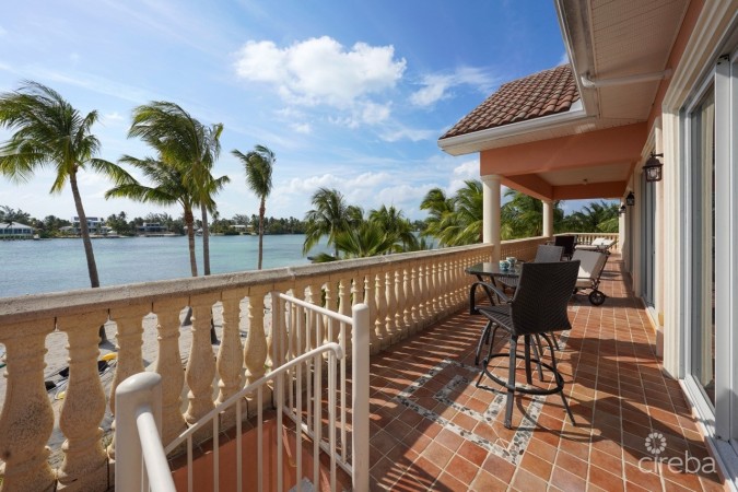 PIECES OF EIGHT, CAYMAN KAI W/200 FT OF BEACHFRONT AND 3 DOCKS