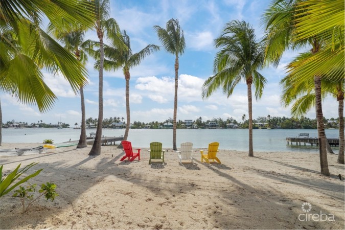 PIECES OF EIGHT, CAYMAN KAI W/200 FT OF BEACHFRONT AND 3 DOCKS