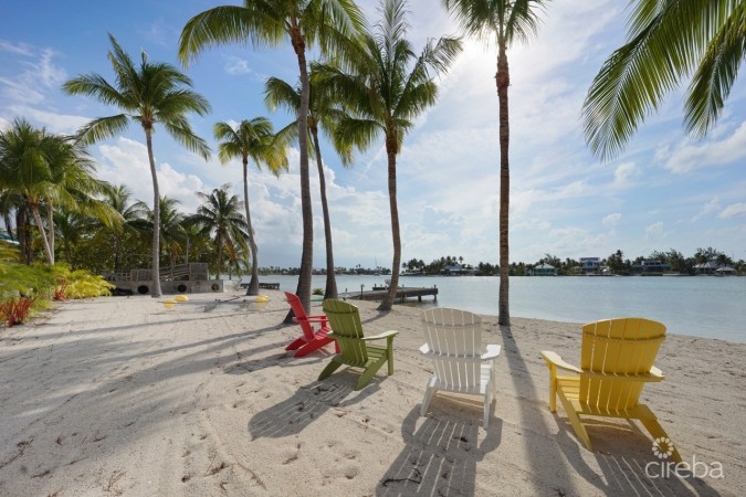 PIECES OF EIGHT, CAYMAN KAI W/200 FT OF BEACHFRONT AND 3 DOCKS