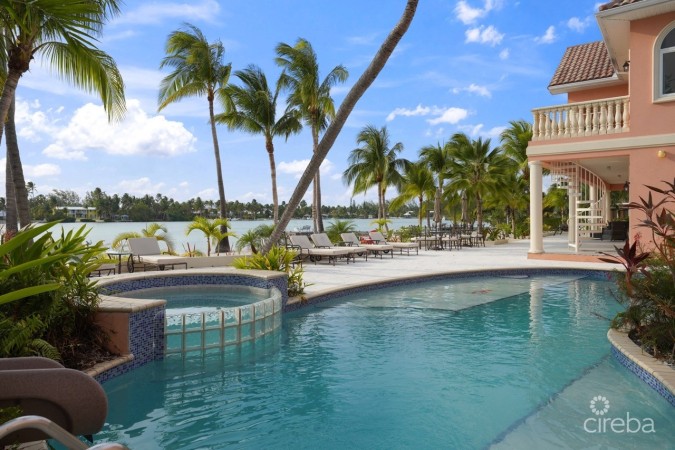 PIECES OF EIGHT, CAYMAN KAI W/200 FT OF BEACHFRONT AND 3 DOCKS