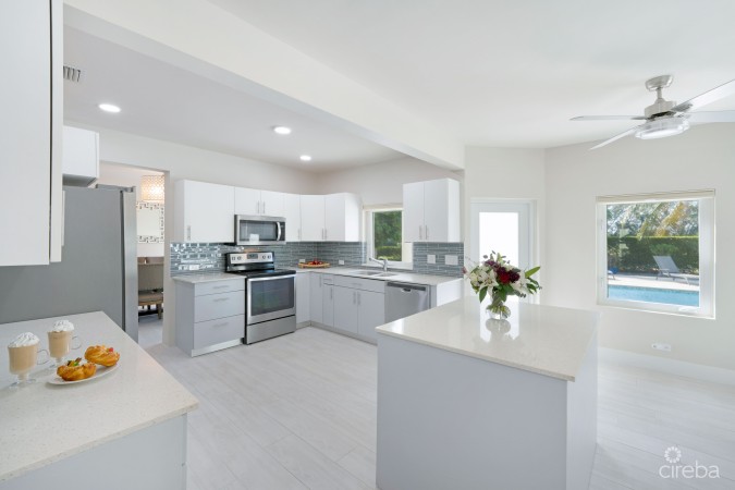 CRYSTAL HARBOUR - MASSIVE $100K REDUCTION, SOLID RENOVATED CANAL FRONT