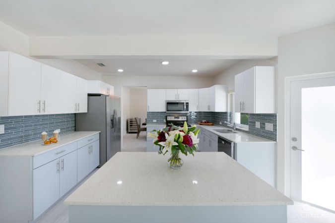 CRYSTAL HARBOUR - MASSIVE $100K REDUCTION, SOLID RENOVATED CANAL FRONT