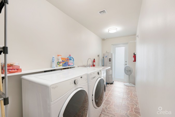 CRYSTAL HARBOUR - MASSIVE $100K REDUCTION, SOLID RENOVATED CANAL FRONT