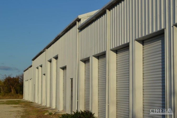 LITTLE CAYMAN WAREHOUSE (20 UNITS) AND LAND SUB-DIVISION  13 LOTS