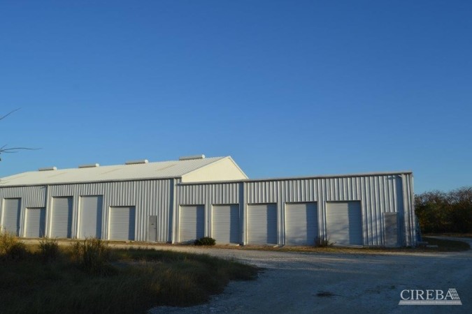 LITTLE CAYMAN WAREHOUSE (20 UNITS) AND LAND SUB-DIVISION  13 LOTS