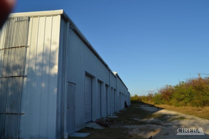 LITTLE CAYMAN WAREHOUSE (20 UNITS) AND LAND SUB-DIVISION  13 LOTS