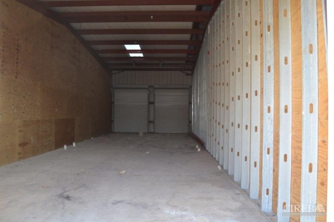 LITTLE CAYMAN WAREHOUSE (20 UNITS) AND LAND SUB-DIVISION  13 LOTS