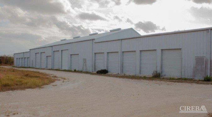 LITTLE CAYMAN WAREHOUSE (20 UNITS) AND LAND SUB-DIVISION  13 LOTS