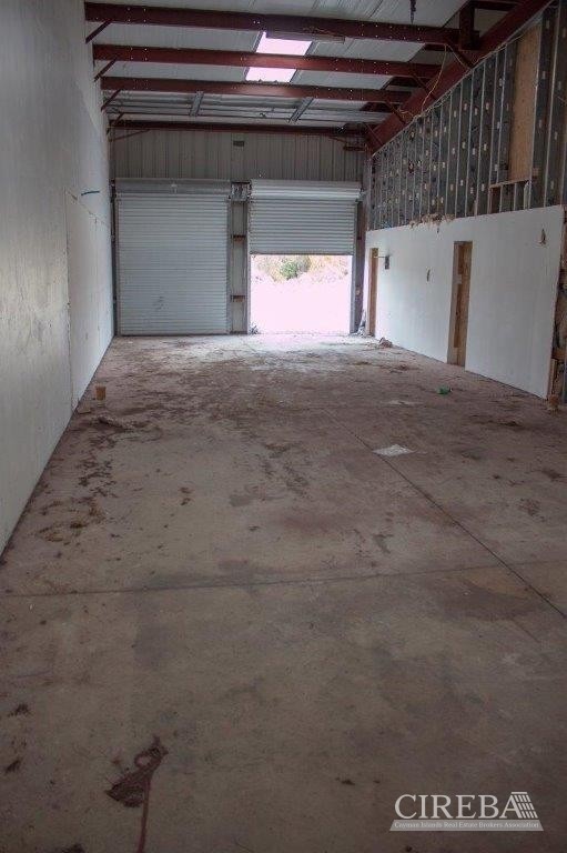 LITTLE CAYMAN WAREHOUSE (20 UNITS) AND LAND SUB-DIVISION  13 LOTS
