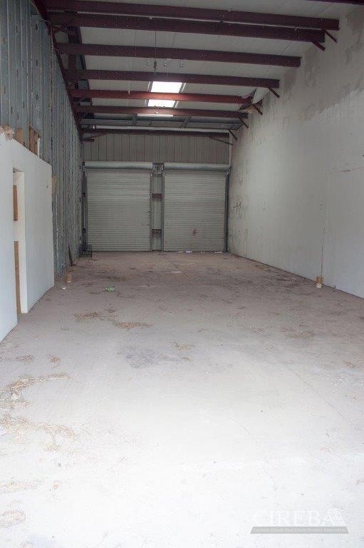 LITTLE CAYMAN WAREHOUSE (20 UNITS) AND LAND SUB-DIVISION  13 LOTS