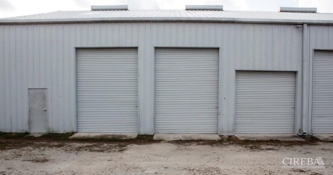 LITTLE CAYMAN WAREHOUSE (20 UNITS) AND LAND SUB-DIVISION  13 LOTS