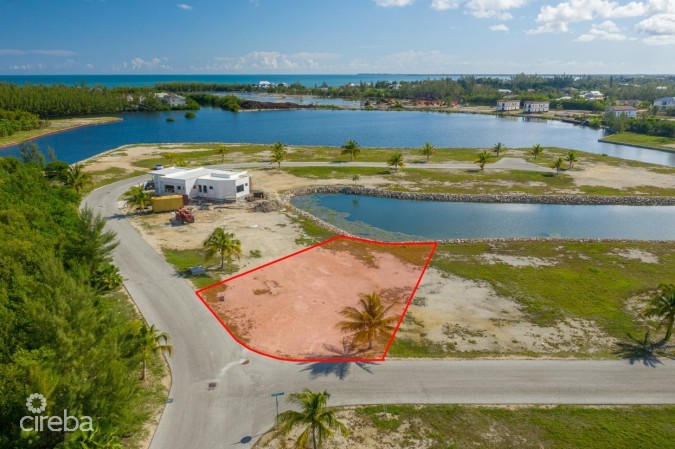 THE CHANNELS CANAL FRONT LOT WITH APPROVED HOUSE PLANS