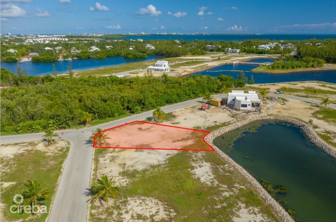 THE CHANNELS CANAL FRONT LOT WITH APPROVED HOUSE PLANS