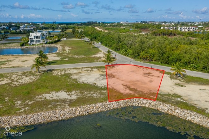 THE CHANNELS CANAL FRONT LOT WITH APPROVED HOUSE PLANS
