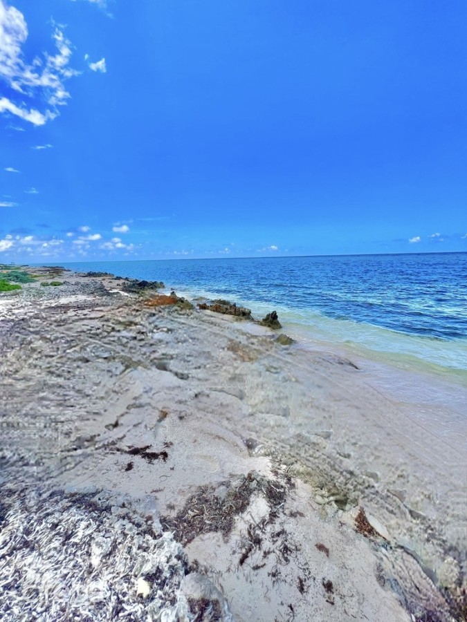 RUM POINT BEACHFRONT LOT WITH CORAL REEF