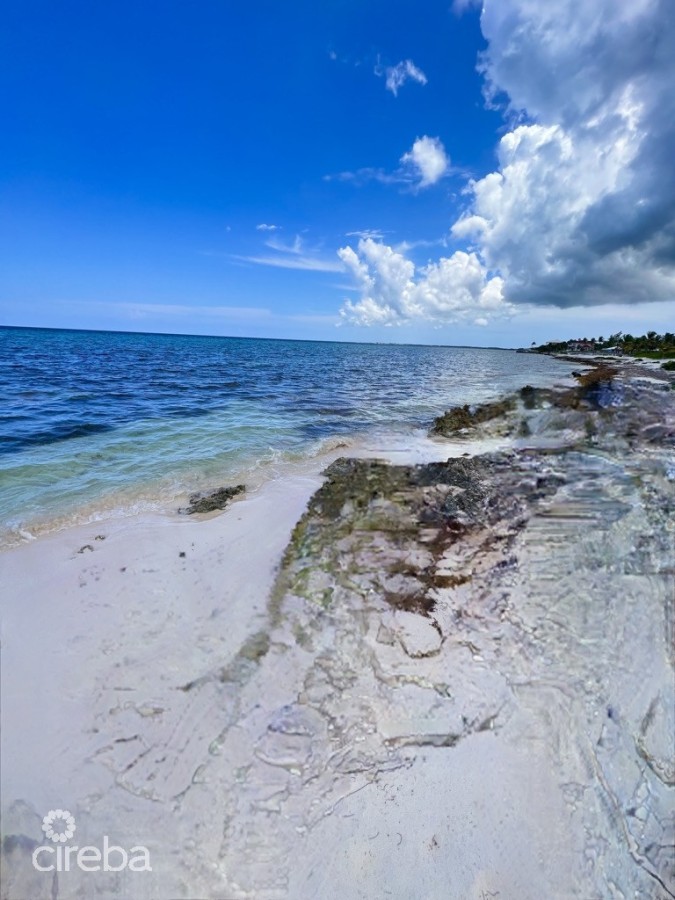 RUM POINT BEACHFRONT LOT W/CORAL REEF STEPS AWAY