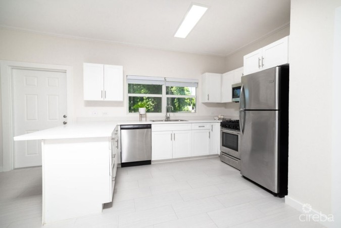 BEAUTIFULLY RENOVATED 3BED HOME WITH DEN + INCOME PRODUCING 1 BED APARTMENT