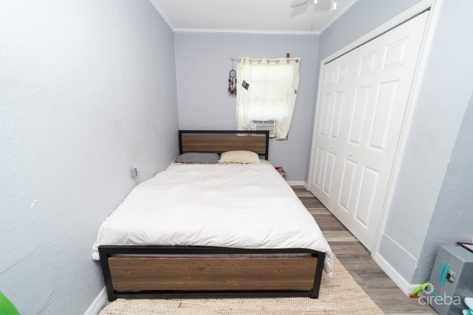WEST BAY HOME WITH ATTACHED APARTMENT