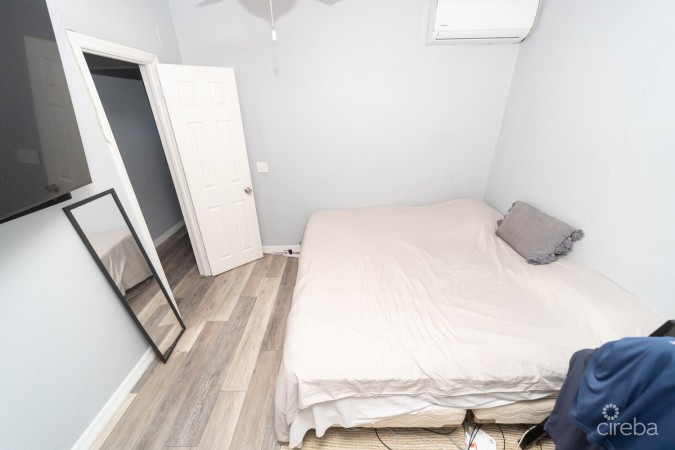 WEST BAY HOME WITH ATTACHED APARTMENT