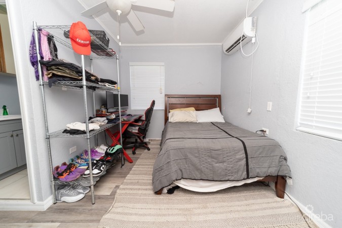 WEST BAY HOME WITH ATTACHED APARTMENT