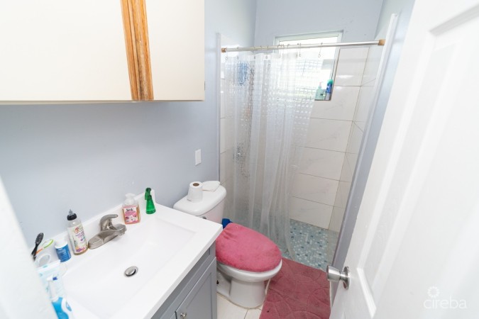 WEST BAY HOME WITH ATTACHED APARTMENT
