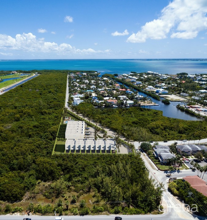 LOTUS - VENDOR PAYS STAMP DUTY - UPGRADED END UNIT - SEVEN MILE CORRIDOR