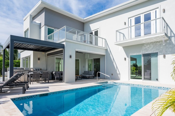 THE ULTIMATE ECO FRIENDLY CANAL FRONT FAMILY HOME