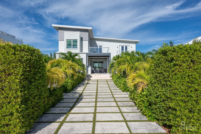 THE ULTIMATE ECO FRIENDLY CANAL FRONT FAMILY HOME