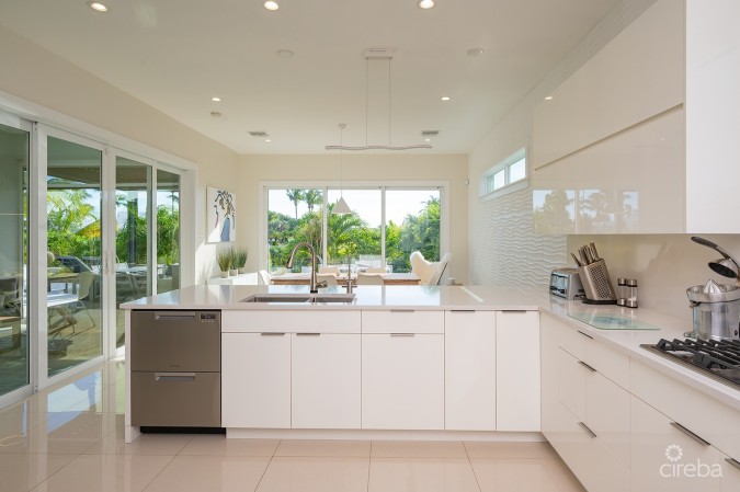 THE ULTIMATE ECO FRIENDLY CANAL FRONT FAMILY HOME