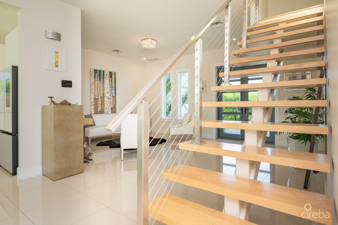 THE ULTIMATE ECO FRIENDLY CANAL FRONT FAMILY HOME