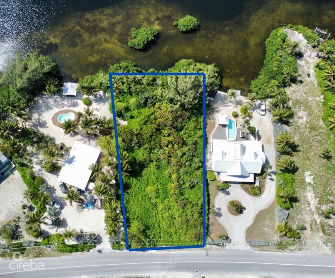 CAYMAN KAI CANAL FRONT LOT - .59 ACRES