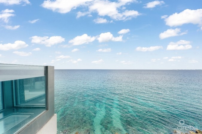 FIN 15 -  PRISTINE THREE BEDROOM SEAFRONT SECOND LEVEL UNIT