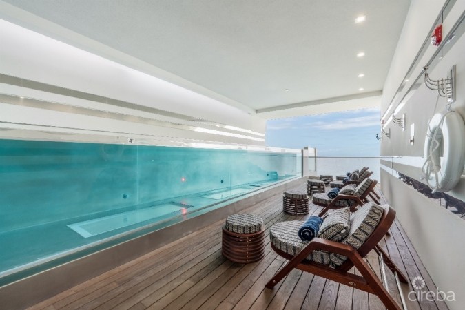 FIN 15 -  PRISTINE THREE BEDROOM SEAFRONT SECOND LEVEL UNIT