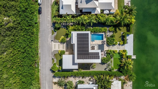 THE ULTIMATE ECO FRIENDLY CANAL FRONT FAMILY HOME