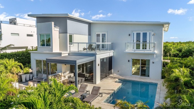 THE ULTIMATE ECO FRIENDLY CANAL FRONT FAMILY HOME