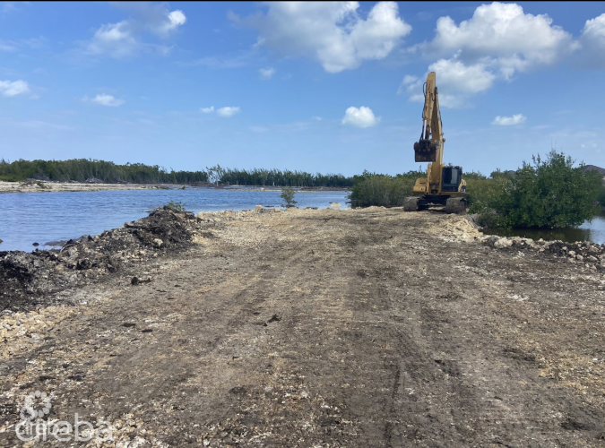 AUBURN BAY, LARGE CANAL FRONT LOT, READY TO BUILD