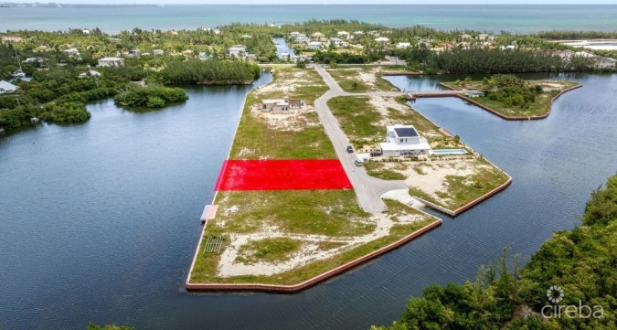 MUSTIQUE COVE CANAL FRONT LOT