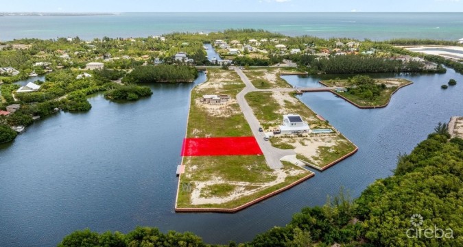 MUSTIQUE COVE CANAL FRONT LOT