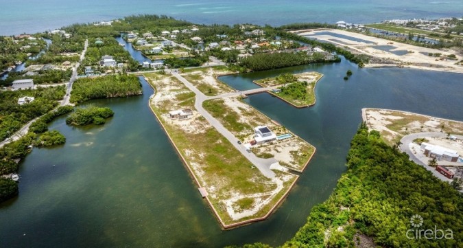 MUSTIQUE COVE CANAL FRONT LOT