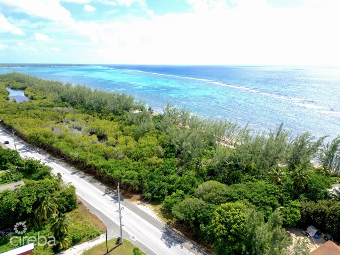 TRANQUIL BEACHFRONT ACRE PARCEL- REEF PROTECTED WITH WHITE SAND