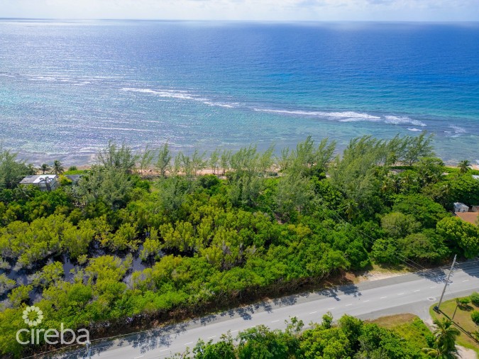 TRANQUIL BEACHFRONT ACRE PARCEL- REEF PROTECTED WITH WHITE SAND