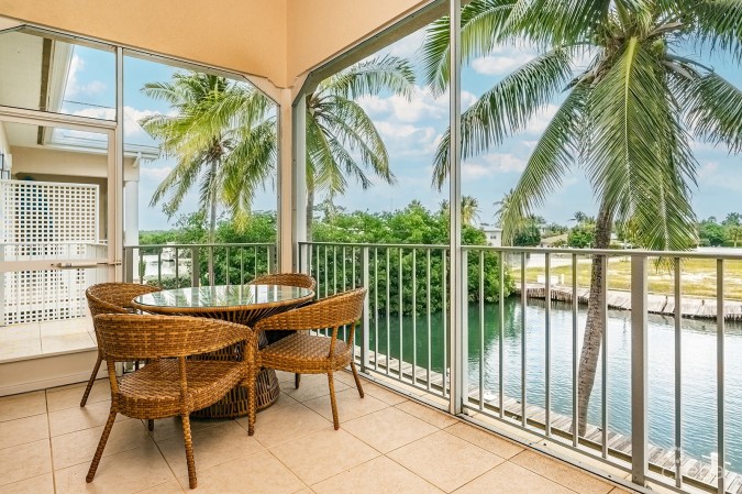 OLIVIA’S COVE #6 | GOVERNORS HARBOUR | CANAL FRONT CONDO