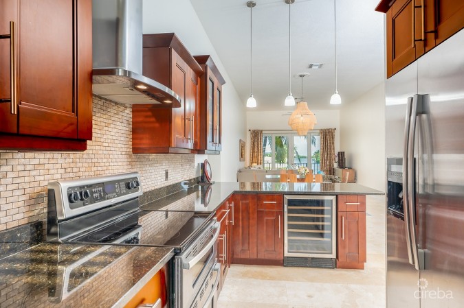 OLIVIA’S COVE #6 | GOVERNORS HARBOUR | CANAL FRONT CONDO