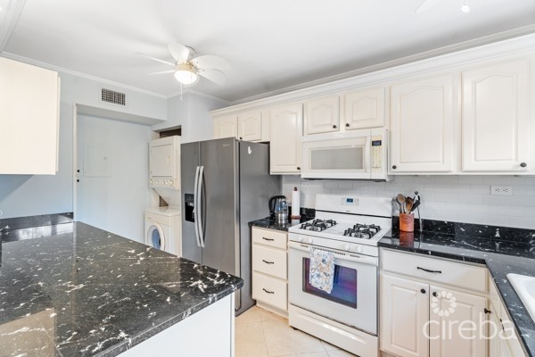 7 MILE BEACH CORRIDOR  3-BED  WATERFRONT TOWNHOUSE ON MAGELLAN QUAY IN GOVERNOR'S HARBOUR