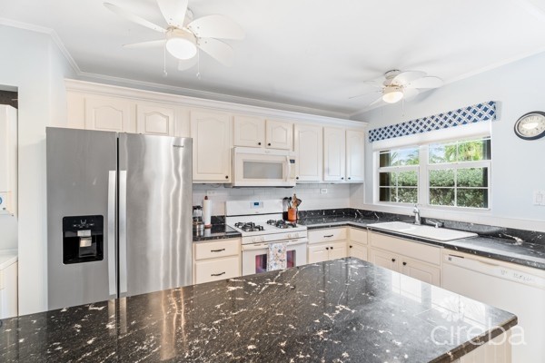 7 MILE BEACH CORRIDOR  3-BED  WATERFRONT TOWNHOUSE ON MAGELLAN QUAY IN GOVERNOR'S HARBOUR